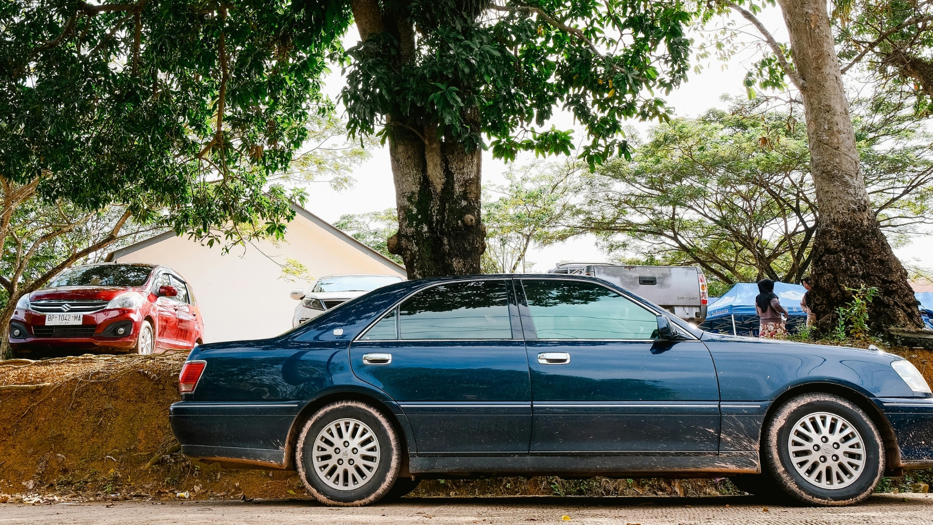 Water spots and streaks left on a vehicle after rain